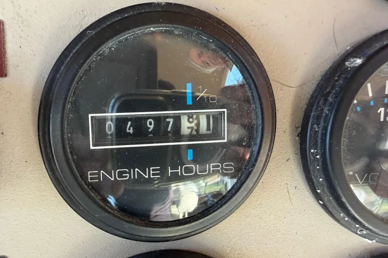 Slide: The Image of Engine hour meter showing 497.7 hours on 2000 Carver 356 Aft Cabin Motor Yacht. - 16