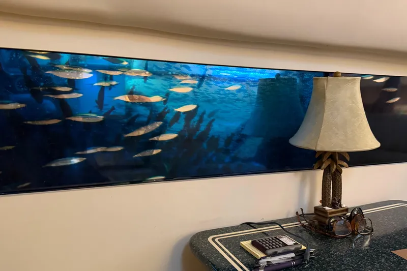 Slide: The Image of Interior of 2000 Carver 356 Aft Cabin Motor Yacht with fish tank and lamp. - 26