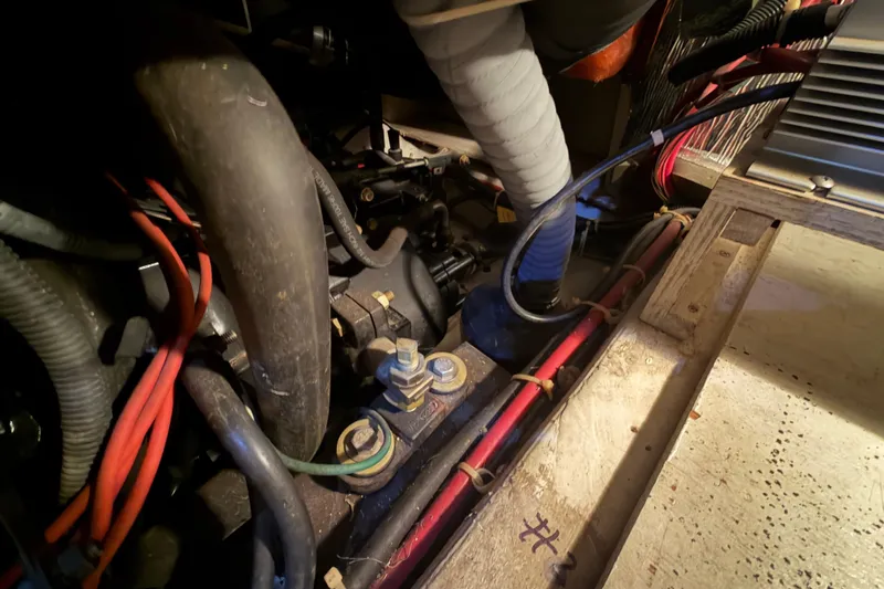 Slide: The Image of Engine room of 2000 Carver 356 Aft Cabin Motor Yacht with visible wiring and components. - 44