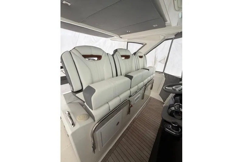 Slide: The Image of 2021 Tiara Sport 38 LS interior with luxurious seating and modern design. - 17