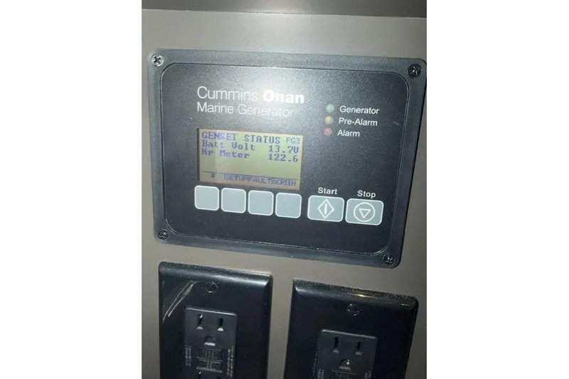 Slide: The Image of Cummins Onan marine generator display on 2021 Tiara Sport 38 LS boat. - 33