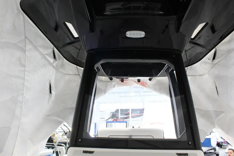 Slide: The Image of 2025 Yamaha Boats 222 FSH Sport E interior view with modern design elements. - 10