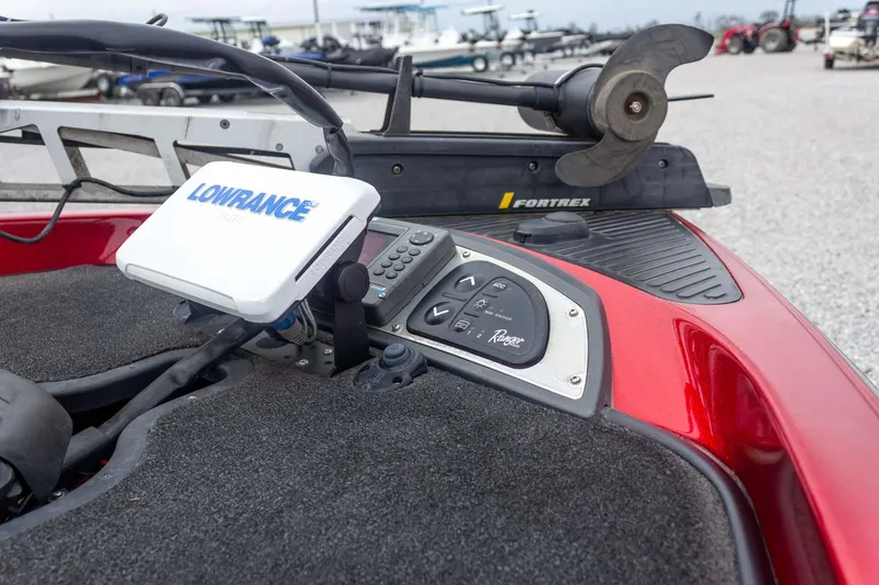 Slide: The Image of 2009 Ranger Z520 Comanche boat dashboard with Lowrance GPS and Fortrex trolling motor. - 18