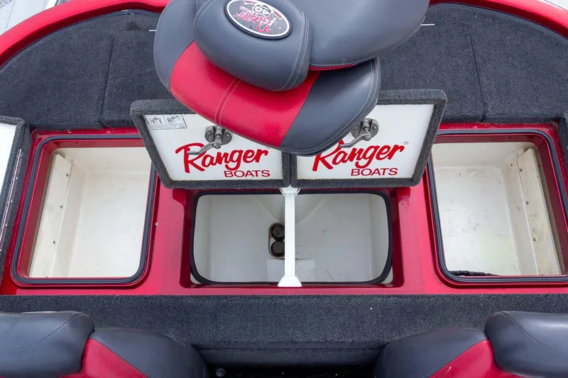 Slide: The Image of 2009 Ranger Z520 Comanche boat interior with storage compartments and seating. - 43