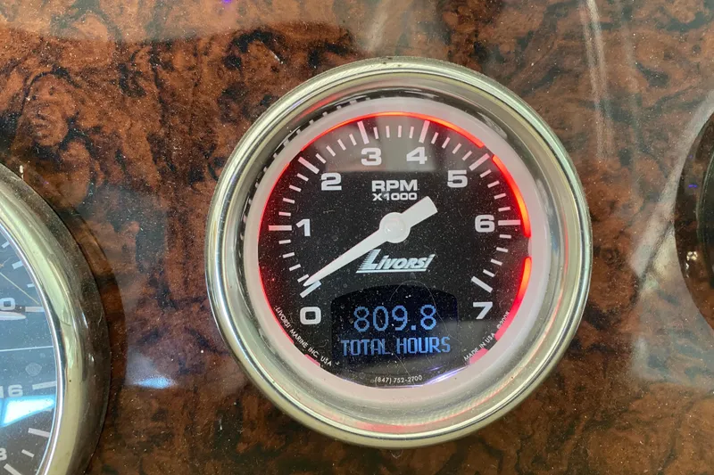 Slide: The Image of Tachometer of 2004 Sea Ray Sundancer 320 showing 809.8 total hours. - 23