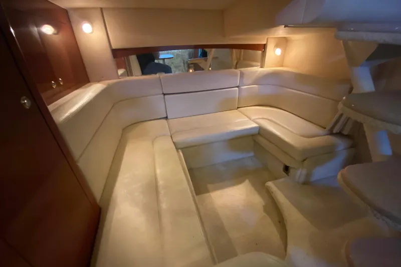 Slide: The Image of Luxurious interior of 2004 Sea Ray Sundancer 320 yacht with plush seating. - 35