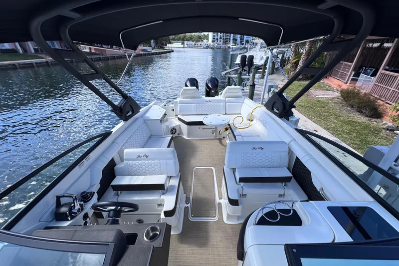 Slide: The Image of 2024 Sea Ray SDX 290 Outboard boat interior, featuring luxurious seating and modern design. - 25