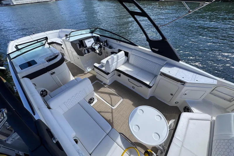 Slide: The Image of 2024 Sea Ray SDX 290 Outboard boat interior with luxurious seating and modern design. - 27
