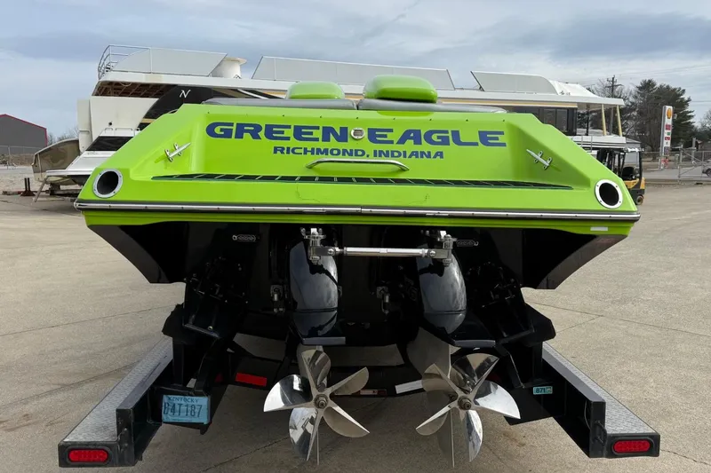 Slide: The Image of 2002 Fountain 42 Lightning boat, bright green, dual propellers, "Green Eagle" branding, Richmond, Indiana. - 5