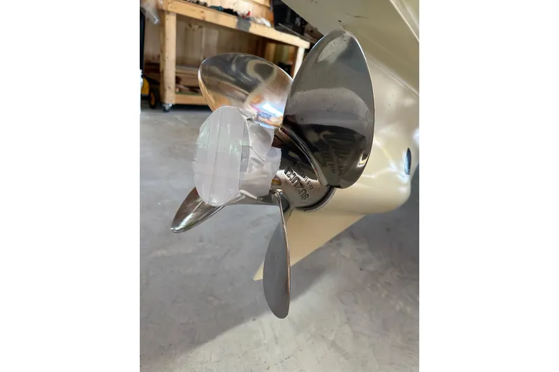 Slide: The Image of 2019 Sea Pro 239 Deep V CC boat propeller in a workshop setting. - 12