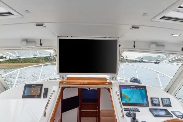 Slide: The Image of Helm of 2018 MJM 40z yacht with navigation screens and controls. - 13