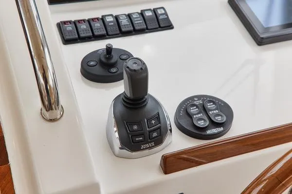 Slide: The Image of Control panel of 2018 MJM 40z boat with joystick and buttons. - 15