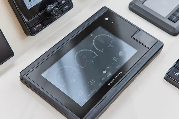 Slide: The Image of Control panel of a 2018 MJM 40z boat featuring a Volvo Penta display. - 19