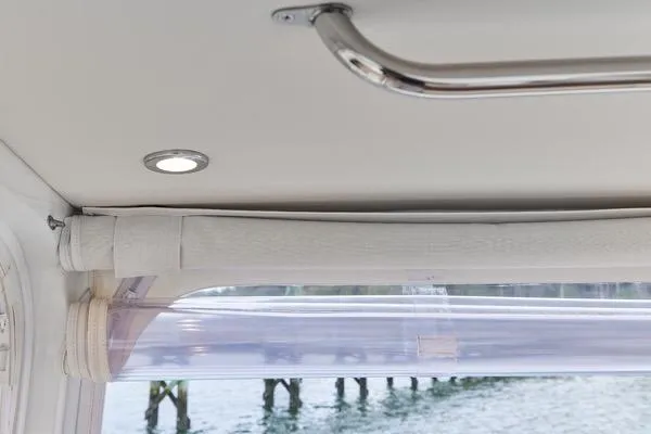 Slide: The Image of Interior view of 2018 MJM 40z yacht, featuring ceiling light and window with water view. - 30