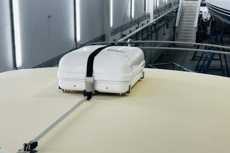 Slide: The Image of Rooftop equipment on 2018 MJM 40z boat in a well-lit indoor facility. - 33