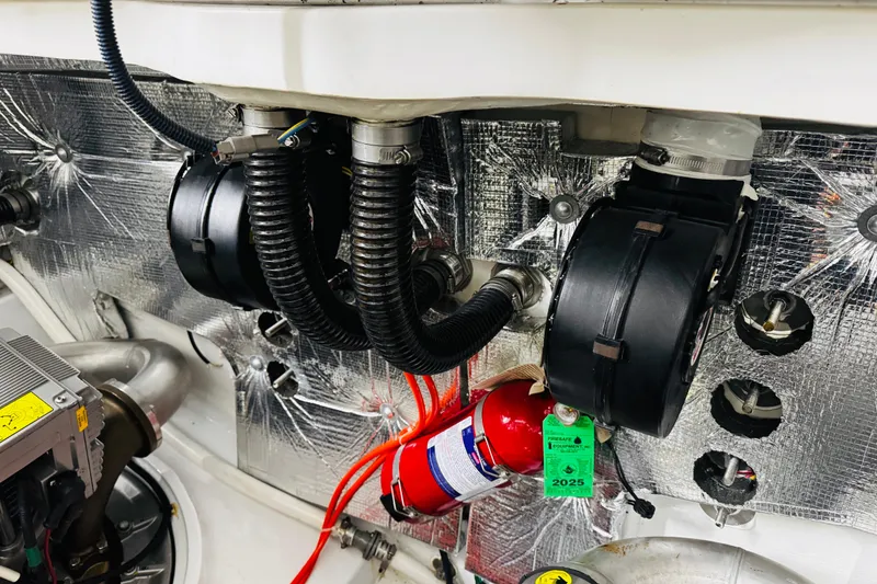 Slide: The Image of Engine room of 2018 MJM 40z with fire extinguisher and insulated components. - 52