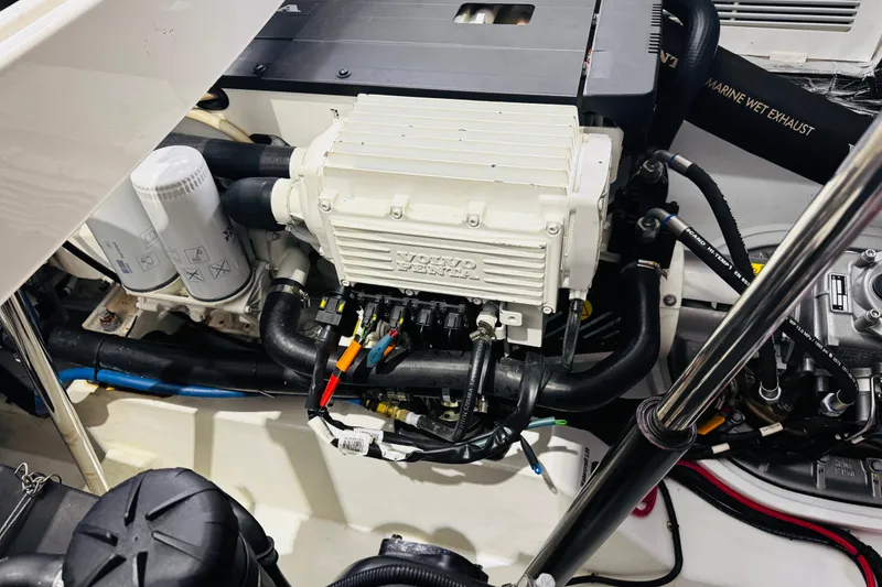 Slide: The Image of Engine compartment of a 2018 MJM 40z boat featuring a Volvo Penta engine. - 53
