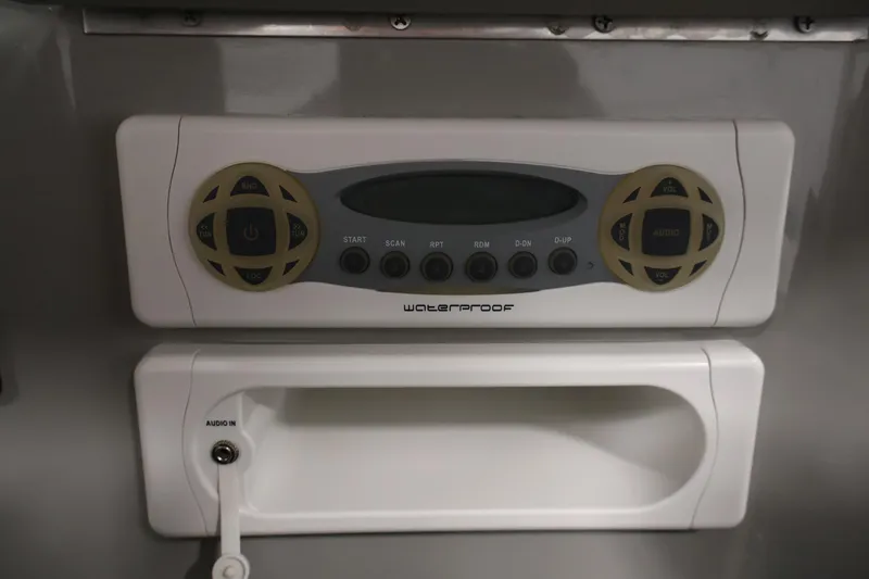 Slide: The Image of Waterproof audio system on 2006 Bayliner 195 Bowrider boat dashboard. - 25
