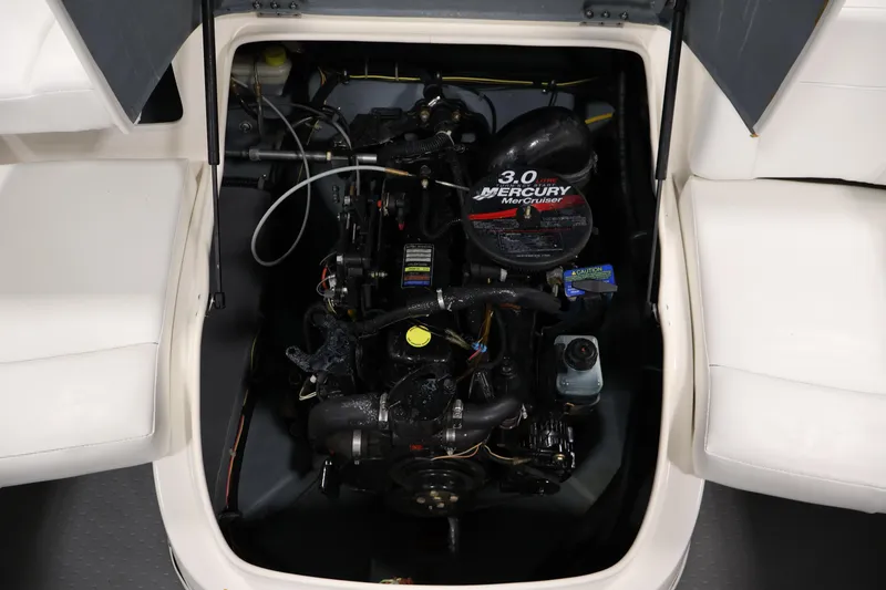 Slide: The Image of 2006 Bayliner 195 Bowrider engine compartment with Mercury MerCruiser 3.0 engine. - 35