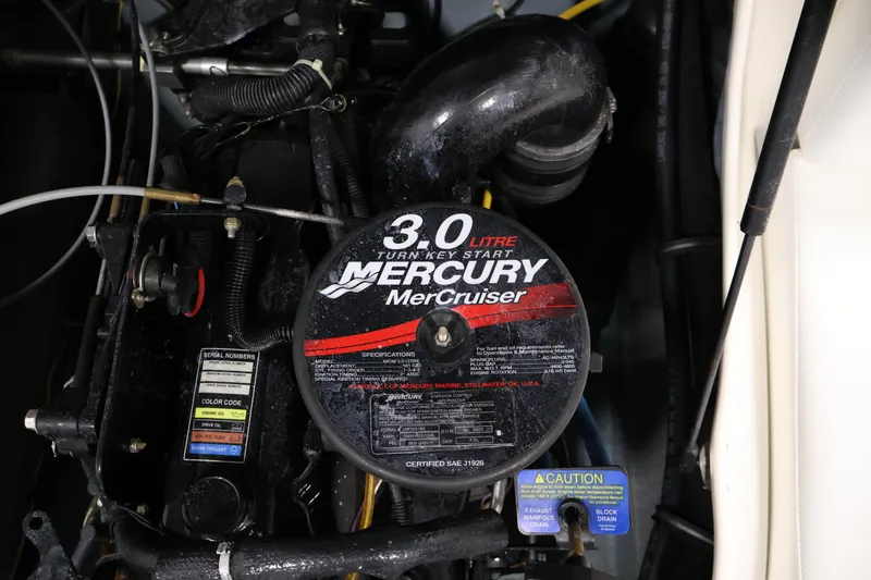 Slide: The Image of 2006 Bayliner 195 Bowrider engine, featuring a 3.0L Mercury MerCruiser. - 36