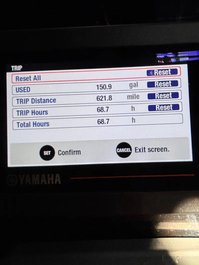 Slide: The Image of Yamaha display showing fuel usage and trip data. - 4