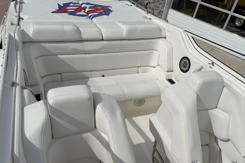 Slide: The Image of Interior of 2000 Fountain 38 Lightning boat with white leather seating. - 24