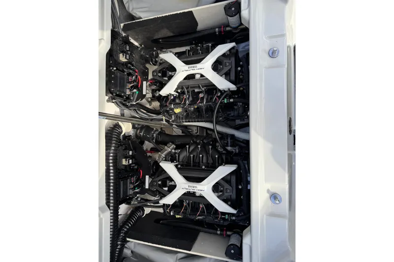 Slide: The Image of 2024 Yamaha Boats 222XE engine compartment showcasing dual engines and components. - 6