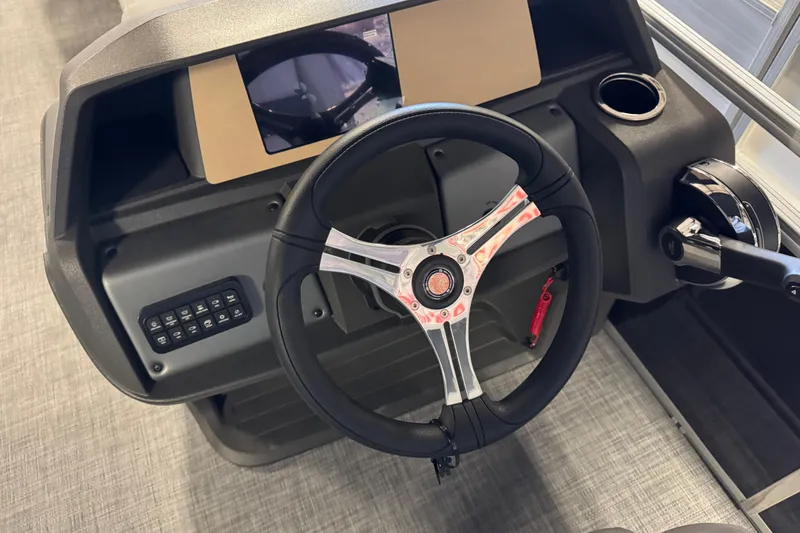 Slide: The Image of Steering console of 2026 Sun Tracker SportFish 20 DLX pontoon boat. - 10