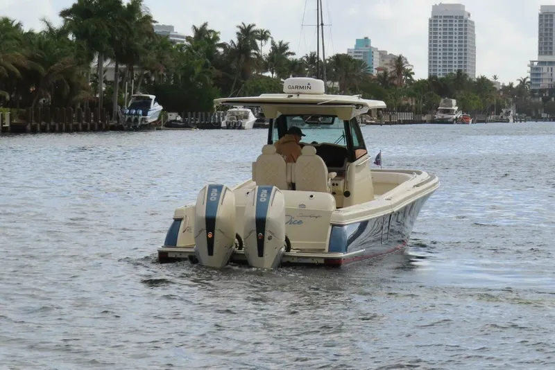 Slide: The Image of 2023 Chris-Craft Catalina 30 boat seats with luxurious diamond stitching, dockside view. - 2