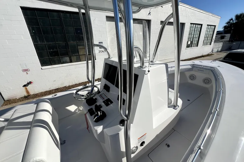 Slide: The Image of 2026 Contender 25 Tournament boat interior with modern console and seating. - 12