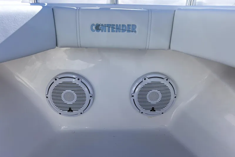 Slide: The Image of 2026 Contender 25 Tournament boat interior with dual speakers and cushioned seating. - 15