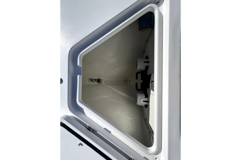Slide: The Image of Open storage compartment on 2026 Contender 25 Tournament boat. - 17