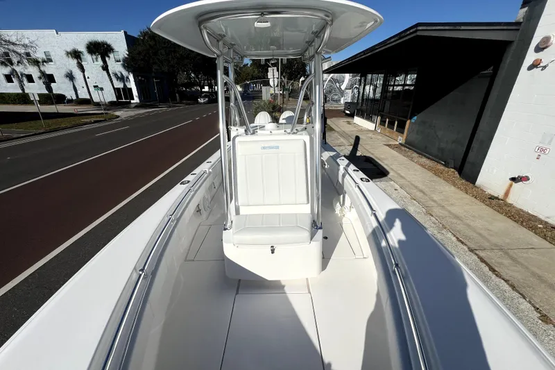 Slide: The Image of 2026 Contender 25 Tournament boat on street, showcasing sleek design and spacious deck. - 18
