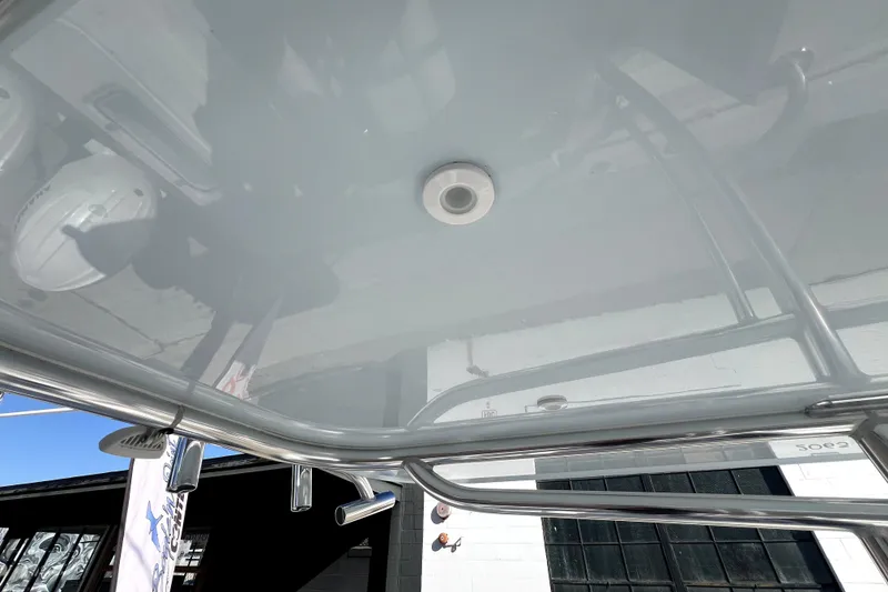 Slide: The Image of 2026 Contender 25 Tournament boat with sleek metal framework and modern design. - 25