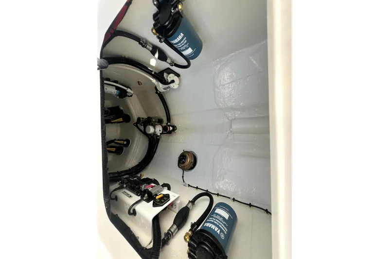 Slide: The Image of 2026 Contender 25 Tournament boat interior wiring and components. - 28