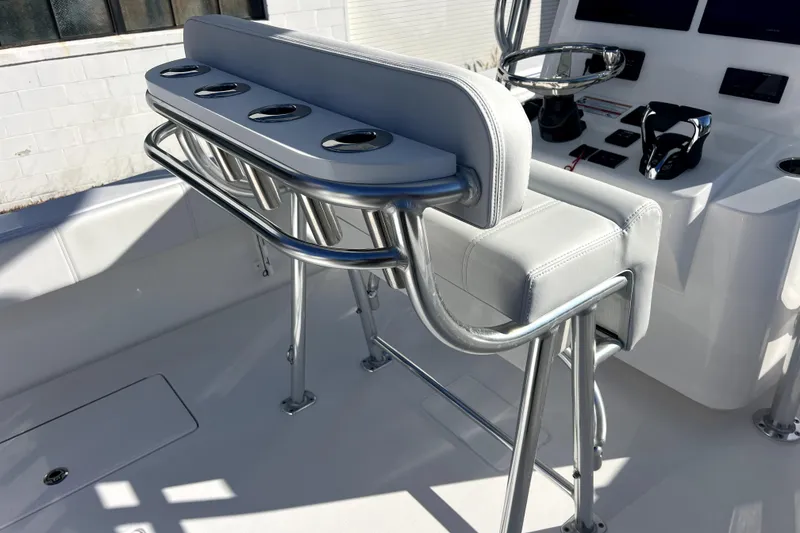 Slide: The Image of 2026 Contender 25 Tournament boat interior with sleek seating and modern controls. - 8