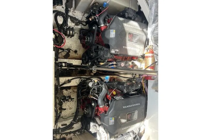 Slide: The Image of Twin Volvo Penta engines in a 2005 Larson Cabrio 290 boat. - 13