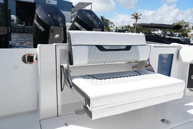 Slide: The Image of 2026 Blackfin 332 CC boat with foldable seating and dual Mercury engines. - 30
