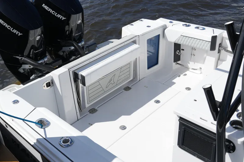 Slide: The Image of 2026 Blackfin 332 CC boat deck with Mercury engines, featuring sleek design and modern amenities. - 32