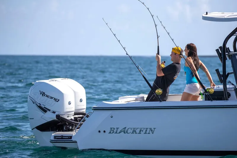 Slide: The Image of Manufacturer Provided Image: 2026 Blackfin 332 CC boat with two people fishing in open water. - 4