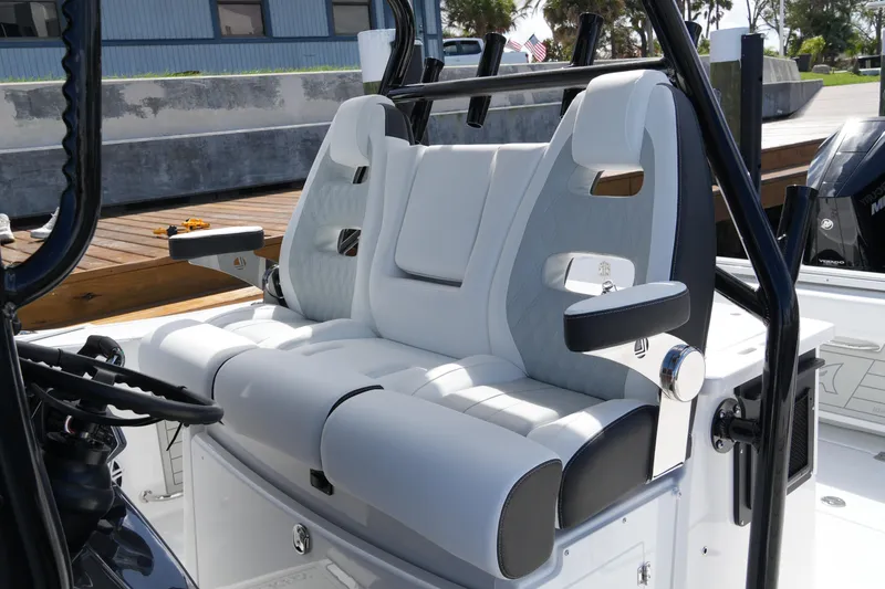Slide: The Image of 2026 Blackfin 332 CC boat interior with luxurious white seating and armrests. - 60