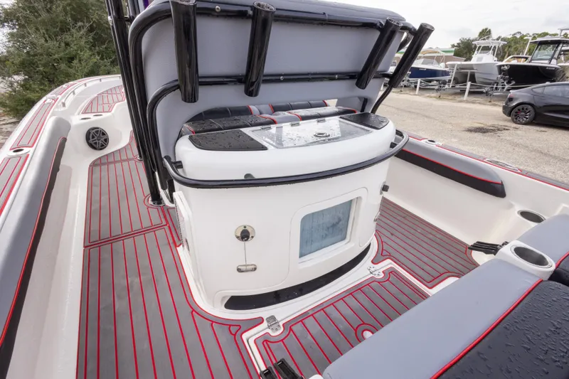Slide: The Image of 2018 ShearWater 26 Carolina boat interior with sleek seating and modern design. - 29