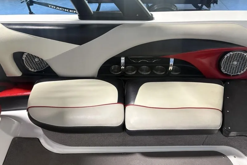 Slide: The Image of Interior seating of 2015 Malibu Wakesetter 247 LSV with cup holders and speakers. - 15