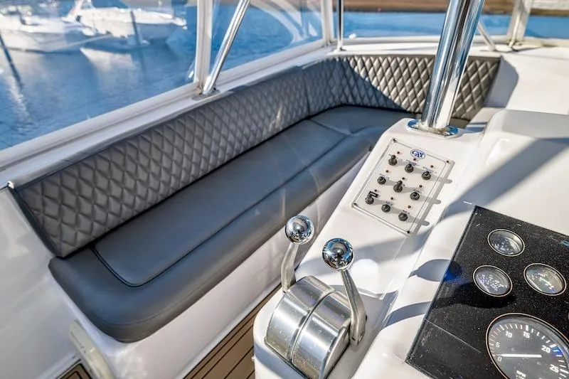 Slide: The Image of Interior of 1991 Ocean Yachts 53 Super Sport with control panel and seating. - 15