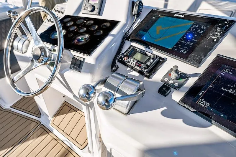 Slide: The Image of Control panel of a 1991 Ocean Yachts 53 Super Sport with navigation equipment. - 20
