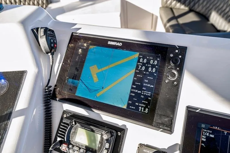 Slide: The Image of Control panel of a 1991 Ocean Yachts 53 Super Sport with navigation display. - 22