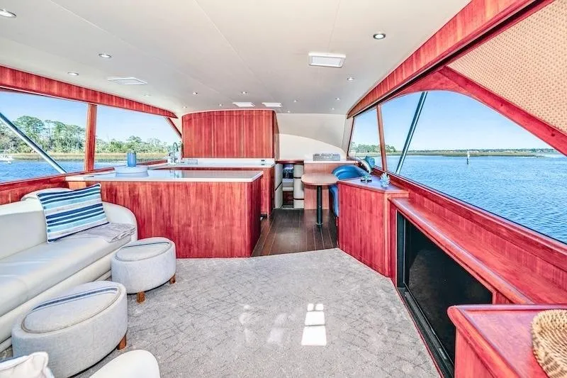 Slide: The Image of Luxurious interior of 1991 Ocean Yachts 53 Super Sport with panoramic windows and elegant furnishings. - 29