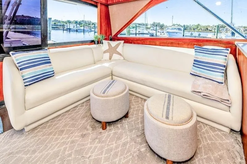 Slide: The Image of Luxurious interior of 1991 Ocean Yachts 53 Super Sport with plush seating and nautical decor. - 30