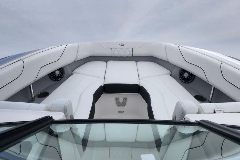 Slide: The Image of Luxurious interior of 2026 Regal LX6 boat with white seating and modern design. - 12