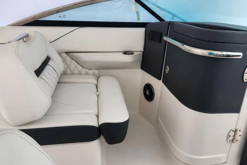 Slide: The Image of 2026 Regal LX6 boat interior with luxurious white seating and modern design elements. - 15
